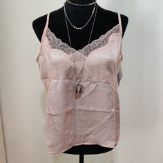 Nwt - Very Beautiful, Lace Trimmed Top. Material Is A Pretty Light Pink. Very Soft, Silky, And Has A Nice Sheen To It. Straps Are Adjustable. A-1 Pink Lace Top Camisole, Feminine Pink Lace Top Camisole, Spring Pink Lace Top Camisole, Pink Lace Top Camisole For Spring, Feminine Pink Cami Camisole, Feminine Pink Tank Camisole, Feminine Pink Tank Top, Chic Pink Camisole For Loungewear, Chic Pink Tank Top For Loungewear