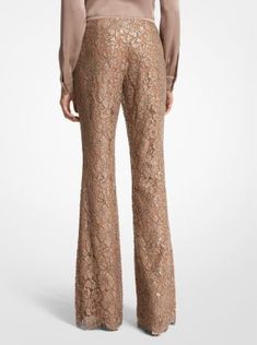 Intricately crafted from floral lace with a suntan-hued lining, these trousers are an ultra-romantic upgrade from basic flares. Featuring elaborate sequin hand-embroidery, they’re designed with a concealed side-zip fastening and scalloped hems. Wear yours with a tonal pullover or a shoulder-baring blouse. Lace Flare Pants For Party, Party Lace Wide Leg Pants, Lace Flare Bottoms For Party, Flare Lace Bottoms For Party, Party Wide Leg Lace Pants, Wide Leg Lace Pants For Party, Full-length Lace Party Pants, Full Length Lace Pants For Party, Full Length Lace Party Pants