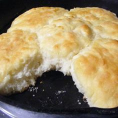 a piece of bread that has been cut in half on top of a skillet