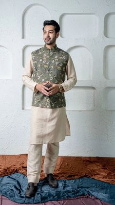 This is a 3-piece set featuring a green linen and cotton silk Kalamkari printed jacket, paired with a beige kurta and matching pants. Perfect for Indian ethnic party or wedding wear, this stylish long kurta set offers a traditional yet modern look for men. Item Contain - Jacket with Kurta & Pant Material : Linen and Cotton Silk Jacket Color : Green  Kurta & Pant Color : Beige  Work : kalamkari Printed Size - (XS), (S), (M), (L), (XL), (2XL) Size chart attached in images mentions garment measurem Spring Cotton Nehru Jacket With Zari Work, Unstitched Cotton Nehru Jacket For Spring, Green Cotton Bandhgala For Diwali, Spring Cotton Bandhgala With Dabka, Traditional Chanderi Sherwani For Spring, Kurta Pant Jacket For Men, Traditional Spring Chanderi Sherwani, Cotton Nehru Jacket For Spring Wedding, Traditional Spring Nehru Jacket With Dabka