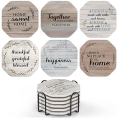 six wooden coasters with different sayings on them