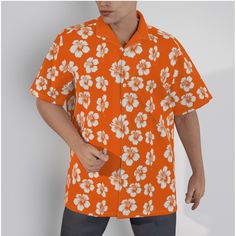 "Add some flair to your wardrobe with this striking bright orange  and white hibiscus flower Hawaiian shirt! This shirt is not only a badass style statement for men of influence, but it's also perfect for a fun date night or a day of boating. Whether you're headed out on the town or just looking to add some tropical vibes to your everyday outfit, this shirt has got you covered. Not only is this shirt eye-catching and unique, but it also embodies the spirit of adventure, fun, and action. The bold Casual Shirt With Hibiscus Print For Spring, Casual Camp Shirt With Hibiscus Print For Spring, Casual Hibiscus Print Camp Shirt For Spring, Orange Collared Tops For Summer, Orange Vacation Shirt For Spring, Casual Collared Top With Hibiscus Print, Orange Shirt For Vacation In Spring, Casual Hibiscus Print Tops With Relaxed Fit, Casual Relaxed Fit Tops With Hibiscus Print