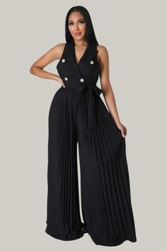 Incorporate sophistication and exclusivity into your wardrobe with this luxurious Button Front Pleated Hem Belted Pleated Wide Leg Jumpsuit. Boasting a lapel neckline and a high waistline, this garment offers a tasteful and elegant fit, while the double button and pleated details elevate its style. The slight stretch fabric provides comfort and versatility, making it the perfect addition to your premium collection. 95% Polyester, 5% Elastane Model is wearing size small Please allow 3-5 business Fitted V-neck Jumpsuits And Rompers With Buttons, Chic Sleeveless Pleated Jumpsuits And Rompers, Elegant Sleeveless Pleated Jumpsuits And Rompers, Elegant Sleeveless Pleated Jumpsuit And Romper, Elegant Pleated Jumpsuits And Rompers For Summer, Chic High Waist Jumpsuits And Rompers, Tailored Pantsuit With Buttons, Fitted Jumpsuit And Romper With Button Closure And V-neck, Fitted Jumpsuit With Button Closure And V-neck