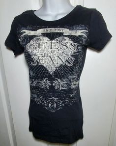 New Guess Jeans Jet Black T-shirt Extra Small XS Heart 1981 | eBay Trendy Black T-shirt With Heart Print, Grunge Cotton T-shirt With Heart Graphic, Black Trendy T-shirt With Heart Print, Fitted Heart Print T-shirt With Crew Neck, Grunge Crew Neck Top With Heart Graphic, Black Short Sleeve T-shirt With Heart Print, Fitted Heart Graphic T-shirt, Fitted Graphic Tee With Heart Design, Black Tops With Heart Graphic And Short Sleeves