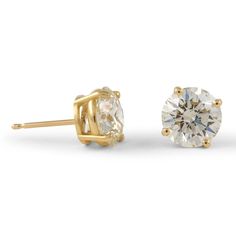 Classic diamond stud earrings. Two matching round brilliant diamonds 3.37 carats total, EGL certified. Both stones L color grade, one stone VS1 clarity grand and the other SI1 clarity grade. Four prong set, 18k yellow gold, 2.35 grams. Accommodated with an up-to-date appraisal by a GIA G.G. once purchased, upon request. Please contact us with any questions. Yellow Gold Stud Earrings, Gold Stud Earrings, Diamond Stud Earrings, Gold Stud, Diamond Stud, Gold Earrings Studs, Diamond Earrings Studs, Diamond Studs, Round Brilliant