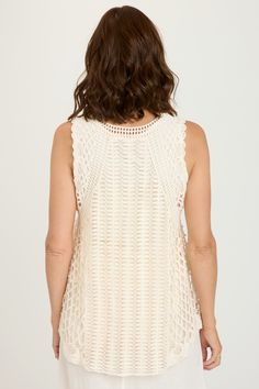 A v-neck cut and asymmetrical hem bring out the best in this layered crochet tank. Delicate and beautiful, Rue absolutely rules! Crochet: 100% Cotton. Cotton Jersey Lining: 100% Cotton. Center Front: ~16". Center Back: ~25.25". Color Description: Pink-tinged light cream. Preshrunk. Machine washable. Imported. MODEL Whitney is wearing size Small. Height: 5'10" | Bust: 34A | Waist: 26" | Hip: 37" Spring V-neck Crochet Dress With Crochet Trim, Spring Open Knit V-neck Tank Top, V-neck Open Knit Tank Top, Spring V-neck Open Knit Tank Top, Sleeveless Crochet Knit Top For Layering, Bohemian Sleeveless Knit Top For Spring, V-neck Crochet Dress With Open Knit, Summer Open Knit Layering Vest, Sleeveless Crochet Top For Layering