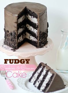 a chocolate cake with white and black frosting