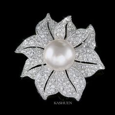 "PERFECT GIFT /WEDDING GIFT FOR BRIDE / BRIDESMAID / LADY! This is a Brand New, stunning Creme white Pearl Flower Brooch. The brooch is made with Swarovski crystals measuring 1 5/8\" (4.2cm) wide and 1 5/8\" (4.2cm) high. Crystal Color: Crystal Clear Prices are in US$. For shipping policies and other important information, click on \"profile\" on the right. See an item that you like but has already been sold? Contact me to see if I have more! Thank you for stopping by Kashuen Collectibles!" Elegant White Wedding Brooches, Flower Shaped Wedding Brooch, Flower-shaped Wedding Brooch, Elegant Flower Bridal Accessories For Wedding, Elegant Floral Bridal Accessories For Wedding, Silver Flower Brooch For Wedding, Silver Wedding Brooch With Flower Decoration, Silver Wedding Brooches With Flower Decoration, Silver Flower Wedding Brooches