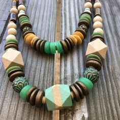 Put this on and walk out the door comfortable that your outfit is pulled together. These necklaces are great for layering, they are light weight and suede strap around back will have you thinking why aren't all necklaces made like this. The beads are a mix of the past 20 years of my jewelry making journey. Thee is wood, ceramic and brass mixed with African recycled glass, a mix of beads that will catch your eye. Each necklace is unique, I never make the same thing twice. I don't believe I'm cook Everyday Bohemian Single Strand Jewelry, Casual Multi-strand Beach Jewelry, Everyday Bohemian Double Strand Jewelry, Casual Multi-strand Jewelry For The Beach, Bohemian Single Strand Beaded Necklaces For Layering, Bohemian Beaded Necklaces With Large Beads For Everyday, Bohemian Double Strand Necklaces For Everyday, Everyday Bohemian Necklace With Wooden Beads, Everyday Bohemian Double Strand Necklace