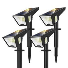 three solar powered lights are shown in front of each other