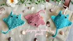 two crocheted sea animals sitting next to each other on a white table cloth