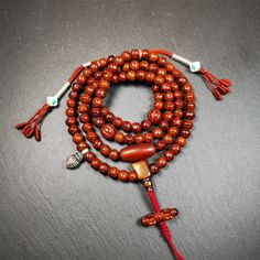 ❤This bodhi beads mala is made by Tibetan craftsmen and come from Hepo Town, Baiyu County, the birthplace of the famous Tibetan handicrafts,about 30 years old, hold and blessed by a lama in Baiyu Monastery.It is composed of 108 bodhi seed beads, and is equipped with 3 agate beads, silver bead counters are installed on both sides, 1 mani jewel bead clip,and finally consists a bone guru bead and vajra on the end, very elegant.❤Details1. Handmade 108 bodhi beads approximately 8mm,mala's perimeter i Pumpkin Beads, Lotus Sutra, Pumpkin Bead, Beads Mala, Om Mani Padme Hum, Green Tara, 30 Years Old, Silver Bead, Mala Beads