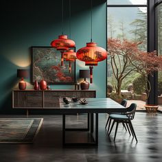 a dining room with green walls and red lanterns hanging from the ceiling