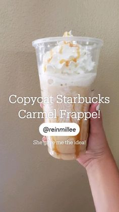 someone holding up a plastic cup with whipped cream and caramel on top, text reads copycat starbuckss carmel frappe