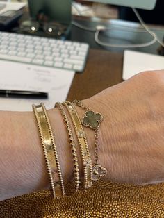 Gold Bangle Stacking Ideas, Vca Perlee Signature Bracelet, Vca Perlee Sweet Clover Bracelet, Gold Bracket Stack, Rose Gold Bracelet Stack, Vca Bracelet Stack, Bracelet Stack Ideas Gold, Hermes Bracelet Stack, Designer Bracelet Stack