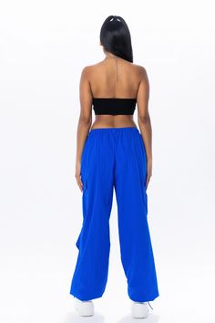 Royal blue cargo pants with an elastic waistband and adjustable ankles. Return Policy WE ONLY OFFER STORE CREDIT FOR RETURNS! Feel free to email us at info@shopluxxeapparel.com or DM us with any questions regarding fit, styling, or our return policy in general. To read more into our return policy please click here. Blue Relaxed Fit Cargo Pants, Blue Stretch Pants With Cargo Pockets, Stretch Blue Pants With Cargo Pockets, Blue Stretch Straight Leg Cargo Jeans, Blue Relaxed Fit Cargo Pants For Summer, Blue Stretch Bottoms With Side Pockets, Blue Wide Leg Cargo Bottoms, Blue Athleisure Pants With Elastic Side Panels, Loosely Fitted Blue Bottoms With Side Pockets