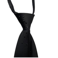 Black tie with black Swarovski elements.  Rhinesones shine and make your outfit more festive. Small black Swarovski crystals have a delicate shine. The necktie is ready to wear, has one-size-fits-all length and knot. Size: 41*8cm Elegant Adjustable Black-tie Event Ties, Elegant Adjustable Accessories For Black Tie Events, Elegant Adjustable Tie For Black-tie Events, Elegant Adjustable Ties For Black-tie Events, Elegant Black Standard Tie And Suit Accessories, Elegant Black Suit And Tie Accessories, Elegant Black Ties For Black-tie Events, Elegant Adjustable Ties For Black Tie Events, Elegant Black Suit And Tie Accessories For Black-tie Events