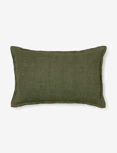 an olive green linen pillow on a white background