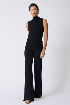 For an elegant look this Spring, our Zoe Jersey Wide Leg pant is the perfect answer. Made in our bamboo jersey, this style can be dressed up with our matching Alina Top. Wide, foldable waistband, wide leg shape, clean finish hem - 95% Bamboo Rayon, 5% Spandex - Made in NYC - Dry clean or machine wash - Our model is 5'9" wearing size S - Waist 29", Total Rise 13", Inseam 35", Leg Opening 25" Orders are processed within three business days (not including weekends or holidays). All pre-orders are c