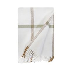 a white and green checkered blanket with fringes on the edges, folded in two rows