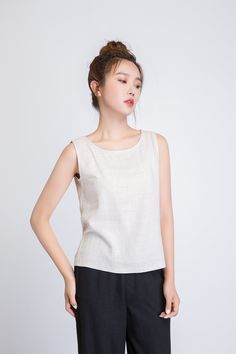 "It's called EveryWear because you can wear this linen tank top... well, everywhere. And we mean everywhere. At the office, happy hour, first dates, second dates, picnics, parties, BBQs, running errands, running 5Ks. You get the idea. DETAILS * 50% linen , 50% cotton blend * Scoop neckline * No zipper * Loose fit * Summer Tank top * Wash by hand or machine with cold water, Ironing after dry * Size Guide https://www.etsy.com/listing/722950722 * SIZE CHART https://www.etsy.com/listing/736810337 * Beige Ramie Top For Summer, Beige Ramie Summer Top, Summer Beige Ramie Tops, Beige Linen Sleeveless Tank Top, Beige Sleeveless Linen Top, Casual Sleeveless Flax Tank Top, Beige Linen Sleeveless Blouse, Casual Flax Linen Tank Top, Casual Flax Tops For Summer