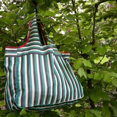 Large striped summer tote Handmade and Striped Summer Bag Canvas shopping bag Reusable shopping bag Fine resistant cotton canvas, evoking classic men's shirts Stripes 1 cm wide green , gray and white . On the front of the bag is sewn a small vintage crest " Hawaii " 4.5 x 2.3 cm Careful tailoring. All interior seams are covered with a coordinated bias tape, made in the main fabric. The outer seams are covered with a red cotton bias ribbon (homemade) with small blue, yellow or green patterns. Uni Green Patterns, Summer Tote, Summer Bag, Canvas Shopping Bag, Bias Tape, Reusable Shopping Bags, Bag Canvas, Green Pattern, Men's Shirts