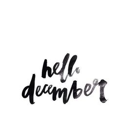 the word hello december written in black ink on a white background with an inscription below it