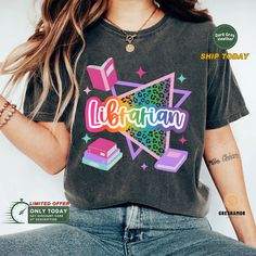 🌟 Final Call: Christmas Orders End Dec 7! 🎄 🔥 Use code SAVEMORE at checkout for 30% OFF with 2+ item order. Don't miss out! Introducing our Colorful Librarian Shirt, a perfect blend of style and comfort for book lovers and librarians alike. Made with high-quality Comfort Colors fabric, this Reading Shirt ensures a soft and cozy feel throughout the day. With its vibrant design and catchy bookish theme, it's an ideal Librarian Tshirt or Gift For Librarian. Whether you're hosting a Book Club or showing Teacher Appreciation, this limited edition Library Tee is sure to make a statement. Embrace your inner bookworm and grab this Book Club Shirt or Gift For Book Lover today! ID2907R05 📏 SHIRT MATERIAL * Super soft, light and comfortable, with the right amount of stretchy makes these short sle Multicolor Crew Neck Shirt For Gift, Trendy Multicolor School Shirt, Multicolor Graphic Tee Shirt For School, Multicolor Graphic Tee Shirt For Gift, Multicolor Graphic Print Tops As Gift, Multicolor Relaxed Fit Tops For School, Relaxed Fit Multicolor Tops For School, Cute Multicolor Shirt With Custom Print, Multicolor Graphic Tee Shirt As Gift