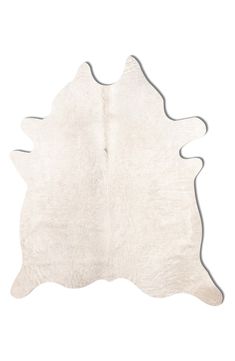 a white cowhide rug on a white background