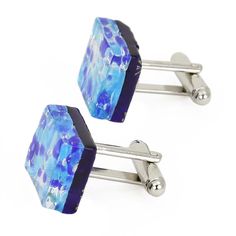 A perfect example of the centuries-old Murano glass tradition, this set of Murano cufflinks is for a man who values elegance and style. Made by hand in Venice using the famous lampworking technique, these Murano cufflinks feature rich colors, intricate patterns and occasional millefiori inclusions, making them perfect for the office, formal event, or just everyday chic. These cufflinks are a great gift for any man with appreciation for European flair and Italian fashion. Each cufflink measures 1 Formal Blue Glass Jewelry, Elegant Blue Cufflinks For Gift, Luxury Glass Jewelry For Formal Occasions, Murano Glass Jewelry, Blue Dangle Earrings, Glass Christmas Tree Ornaments, Everyday Chic, Handmade Handbags, Christmas Figurines