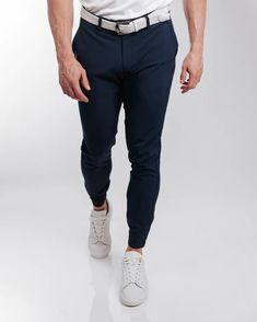 4-way Stretch Joggers With Comfort Waistband, Tapered Leg Sports Bottoms With 4-way Stretch, Navy Casual 4-way Stretch Bottoms, Moisture-wicking Tapered Leg Pants With 4-way Stretch, Athleisure Stretch Bottoms For Golf, Moisture-wicking Elastane Pants For Jogging, Athleisure Activewear For Golf, Stretch Athleisure Bottoms For Golf, Golf Bottoms With Go-dry 4-way Stretch