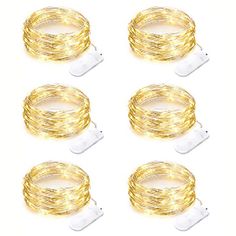 four gold wire lights are shown with one light on each side and the other in different positions