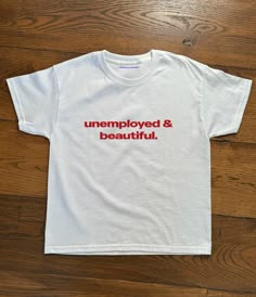 unemployed & beautiful. new baby tee design just added to the site ☆ Baby Tee With Words, Baby Tees With Words, Baby Tee Designs, Baby Tee Ideas, Grandpa Fashion, Baby Tee Outfit, Tshirt Inspiration, Sarcastic Clothing, Funny Baby Tees