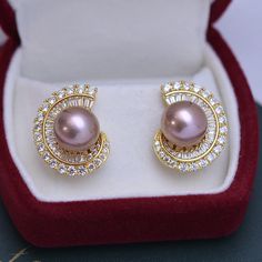 Elevate your elegance with our 11-12mm Freshwater Pearl Ear Studs adorned with sparkling cubic zirconia. The lustrous pearls, ranging from 11-12mm, exude timeless sophistication, while the cubic zirconia adds a touch of glamour. These exquisite ear studs effortlessly blend classic and contemporary, making them a radiant and versatile accessory. Material: Freshwater Pearl with 925 sterling silver Product Information Pearl Type Freshwater Pearl Origin China Shape Round Quality AAAA Size 11-12mm Na Luxury Pearl Earrings With Cubic Zirconia For Evening, Luxury Cubic Zirconia Pearl Earrings For Formal Occasions, Luxury Baroque Pearl Earrings, Large Pearl Earrings, Freshwater Pearl Bracelet, Freshwater Pearls Earrings, Square Pendant, White Freshwater Pearl, Pearl Set