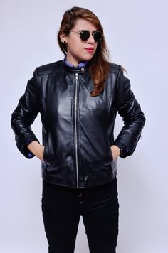 Leather jackets are a classic and versatile item that will always be in fashion. This leather jacket is timeless and classic. Made of 100 % authentic lambskin leather, this jacket will definitely become the "must" staple style statement piece for your wardrobe. XS S M L XL Chest 36 38 40 42 44 Shoulder 16 16 16.5 17 17 Waist 34 36 38 40 43.5 Womens Black Leather Jacket, Lambskin Jacket, Longline Jacket, Lambskin Leather Jacket, Biker Style, Black Leather Jacket, Sporty Look, Leather Jackets Women, Style Statement