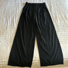 Never Worn Wide Leg Trousers Black Wide Leg Bottoms For Business Casual, Black Wide-leg Dress Pants For Summer, Black High Waist Wide Leg Pants For Business Casual, Black High-waisted Dress Pants For Summer, Black Dress Pants With Pockets For Party, Black High-waisted Wide Leg Pants For Business Casual, Wide Leg Pants For Going Out, Black Wide-leg Pants For Going Out, Casual Black Wide Leg Pants For Going Out