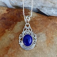 Cheap Silver Lapis Lazuli Jewelry, Affordable Silver Lapis Lazuli Jewelry, Formal Spiritual Sterling Silver Jewelry, Sterling Silver Spiritual Jewelry For Formal Occasions, Formal Silver Lapis Lazuli Jewelry, Silver Lapis Lazuli Jewelry For Formal Occasions, Silver Lapis Lazuli Jewelry For Formal Events, Sapphire Lapis Lazuli Jewelry For Anniversary, Ornate Sterling Silver Oval Pendant Necklace