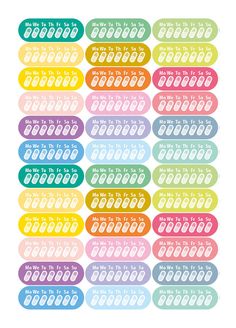 rainbow stickers with the words, we are all in this world and numbers on them