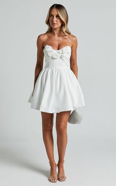 Angeletta Mini Dress - Sweetheart Rosette Detail Fit & Flare in White | Showpo Spring Coquette Mini Dress, Spring Mini-length Bridesmaid Corset Dress, White Feminine Corset Dress With Ruched Bodice, Summer Bridesmaid Mini Dress With Sweetheart Neckline, Spring Bridesmaid Mini Corset Dress, Flirty Mini Dress For Bridesmaids, Spring Mini Dress With Ruched Bodice And Sweetheart Neckline, Spring Mini Dress With Sweetheart Neckline And Ruched Bodice, Spring Mini Length Flirty Dress