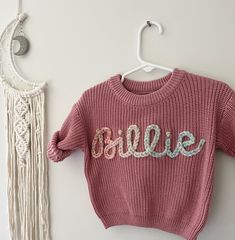 100% cotton oversized chunky knitted sweaters! perfect for birth announcements, newborn/family photos, baby shower gifts, birthday gifts! Each name is hand embroidered and made to order, therefore no two will look the exact same. *Please note that 0-3 is not available in Cream, Navy or Spruce(darker green available In that size if interested)* Yarn: extra chunky- best for 5 letters or less on smaller sweaters. If you're unsure about yarn type and length of name reach out to me for recommendation Cute Cotton Chunky Knit Sweater, Personalized Cute Crew Neck Sweater, Personalized Pink Crew Neck Sweater, Personalized Pink Sweater For Winter, Cute Cotton Crochet Sweater, Cute Crochet Cotton Sweater, Chunky Knitted Sweaters, Baby Name Sweater, Name Sweater