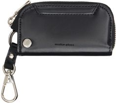 Waterproof 3M™ SCOTCHGARD®-treated buffed leather key case in black. · Stain- and oil-resistant · Lanyard-clasp fastening at top · Logo stamp and card slot at face · Zip closure · Four lanyard-clasp fastenings at interior · Two card slots at interior · YKK® Excella® hardware · H3.25 x W4.25 x D0.75 Supplier color: Black Modern Black Wallet With Key Clip, Black Lanyard, Leather Key Case, Master Piece, Black Gloss, Smart Key, Handbag Wallet, Male Cards, Black Phone Case