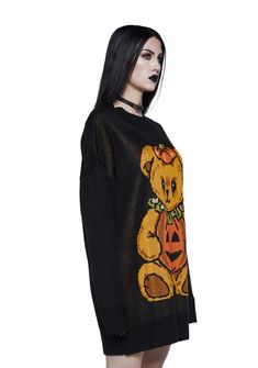 I was haunted to meet you. This oversized sweater has long sleeves, a crew neckline, and a lil bear in a jack-o-lantern intarsia pattern. Intarsia Patterns, Costume Store, Oversized Sweater, Dolls Kill, Black Media, Jack O Lantern, Exclusive Collection, Black Sweaters, Crew Neckline