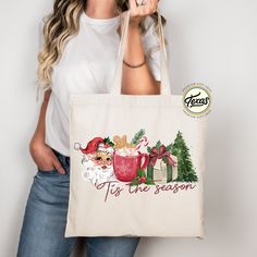 Distressed Tis the Season Tote Bag, Christmas Tree and Coffee Gift Bag, Retro Christmas Bag, Santa Claus Tote Bag Gift, Cute Winter Tote Bag We are here to offer you the best tote bag options which are perfect as a gift for you, your company, or your friend! They are also the ideal Wedding, Bridal Party, Baby Shower, Birthday Party or Proposal gift. The design color used in this listing is a single type. The same design is used for all tote bag colors. There will be no change in the design color Christmas Tote Bag As Gift, Christmas Tote Bag Gift, Christmas Gift Tote Bag, Winter Tote Bag, Blank Tote Bag, Winter Tote, Best Tote Bags, Coffee Gift, Christmas Gift Bags