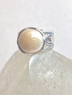 Pearl ring sterling silver boho women girlsSize  8Weight     7.4g Length   1/2Width      5/8"Thinnest part  3/8"Free Shipping & Free Postal Insurance Delivered in a Gift Box If you do not want the ring polished and want to leave the natural patina please let me know at the time of purchase as I do polish rings before I ship rings out. ThanksFree First Class shipping and postal insurance is included. If you want to upgrade to priority kindly pay an additional fee to do so.  This is recommende Hallmarked Oval Pearl Ring In Sterling Silver, Silver Cabochon Pearl Ring For Gifting, Hallmarked Sterling Silver Oval Pearl Ring, Sterling Silver Cabochon Pearl Ring Gift, Hallmarked Sterling Silver Pearl Ring For Gift, Silver Pearl Ring, Wolf Ring, Mermaid Ring, Mermaid Pendant