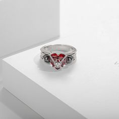 Skull Ring For Her With Heart Cut Garnet Inlaid In Two Tone-VANCARO Gothic Rings For Valentine's Day Gift, Valentine's Day Gothic Rings As Gift, Elegant Red Skull Ring For Gift, Elegant Red Skull Ring For Anniversary, Disney Wedding Rings, Skull Engagement Ring, Commitment Rings, Engagement Ring Women, Gothic Ring