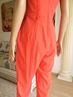 "orange Jumpsuit S Christmas Gift womens Coveralls One Piece orange Coveralls vintage womens Jumpsuit womens Overalls summer Clothing beach Made in SriLanka height of the woman in the photo - 180 cm Please refer to photos for details of condition. Condition: very good vintage Measurements : Length: 120 cm/47.2\" Bust: 88 cm/34.7\" Waist 72 cm/ 28.3\" Hips: 100 cm/39.4\" Inseam 66 cm/26\" Tag Size EUR 38 US 6 UK 10 note The color on the pictures may vary due to monitor settings and light reflecti Summer Orange Sleeveless Jumpsuits And Rompers, Sleeveless Orange Jumpsuits For Summer, Summer Orange Overall Jumpsuits And Rompers, Orange Summer Overalls Jumpsuit, Orange Summer Jumpsuit Overall, Red Jumpsuits And Rompers With Pockets For Beach, Red Beach Jumpsuits And Rompers With Pockets, Red Beach Jumpsuit With Pockets, Red High-waisted Jumpsuits And Rompers For Summer