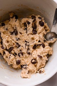 a bowl filled with dough and chocolate chips