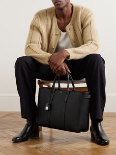 CELINE HOMME's tote bag is guaranteed to become part of your everyday wardrobe. Stylish and practical, it's crafted from supple leather with a full-grain finish that helps resist scuffing. It's detailed with a small foiled logo and buckled straps that can be adjusted so you can find the right drop. Bags For Men Aesthetic, Black Bag Outfit Casual, Men Work Bag, Celine Outfit Men, Men Luxury Outfit, Men’s Bags, Mens Leather Bag Work, Celine Menswear, Ceo Outfit