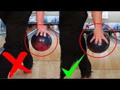 two people holding bowling balls in their hands and pointing them at each other's backs