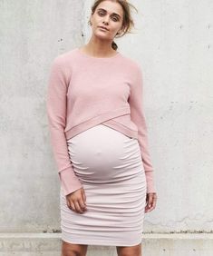 Features This pink maternity skirt is made in our super-stretchy, super-luxe jersey so it will keep you feeling and looking great (!) With side gathers, it has lots of room for a growing bump. It has been cleverly cut so that it sits over the bump for maternity but can be worn on the wait pre/post babe too. In a beautifully neutral shade of dusty pink, it looks great with sandals or boots for a dressy vibe but we love it paired with a tee and sneaks for everyday too. We have selected a super-str Maternity Crop Top Outfits, Pregnancy Outfits Dressy, Maternity Crop Top, Pregnancy Outfit Ideas, Maternity Crop Tops, Spring Maternity Outfits, Maternity Boutique, Modern Maternity, Count Your Blessings